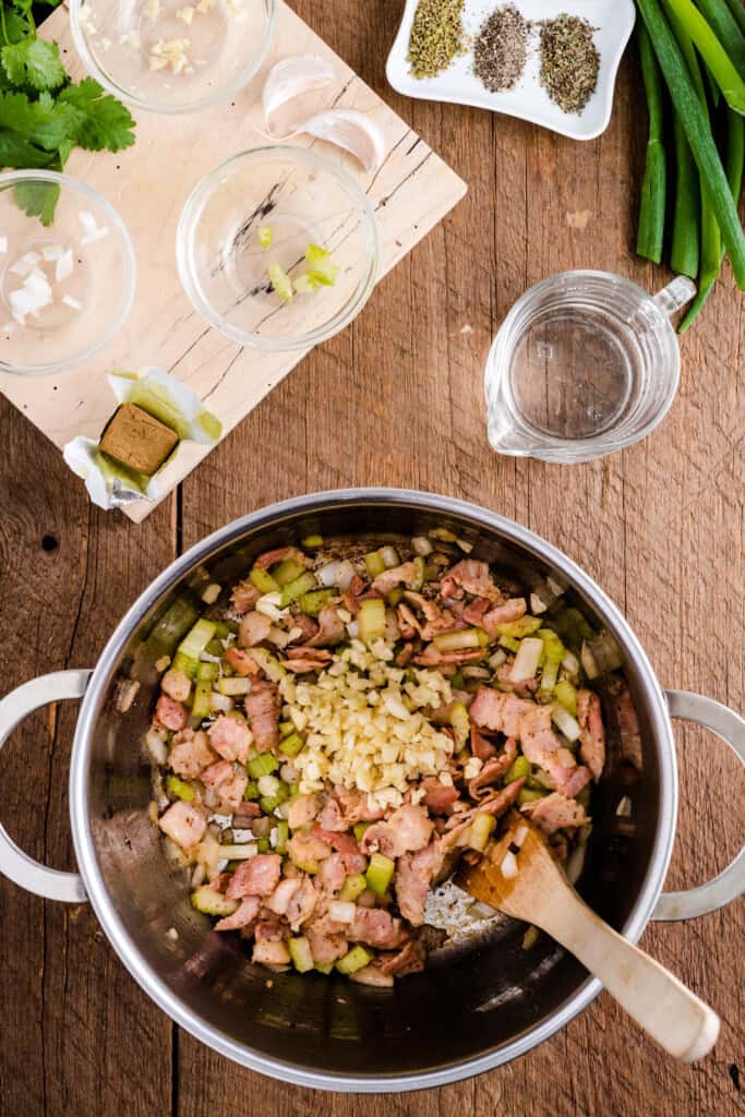 diced onion celery and bacon in stock pot