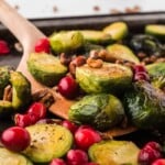 Closeup of Brussels sprouts and cranberries.