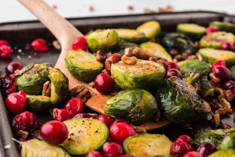 Closeup of Brussels sprouts and cranberries.