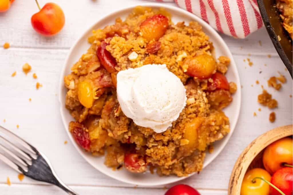 overhead view of cherry crumble a la mode