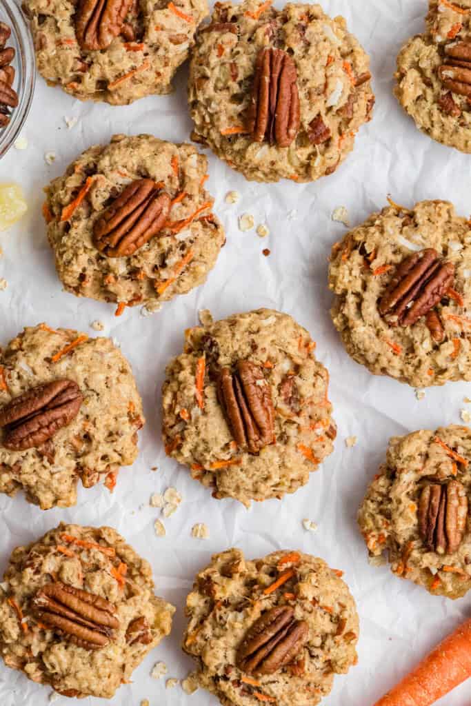 Overhead view of carrot cake breakfast cookies with pecans on top.