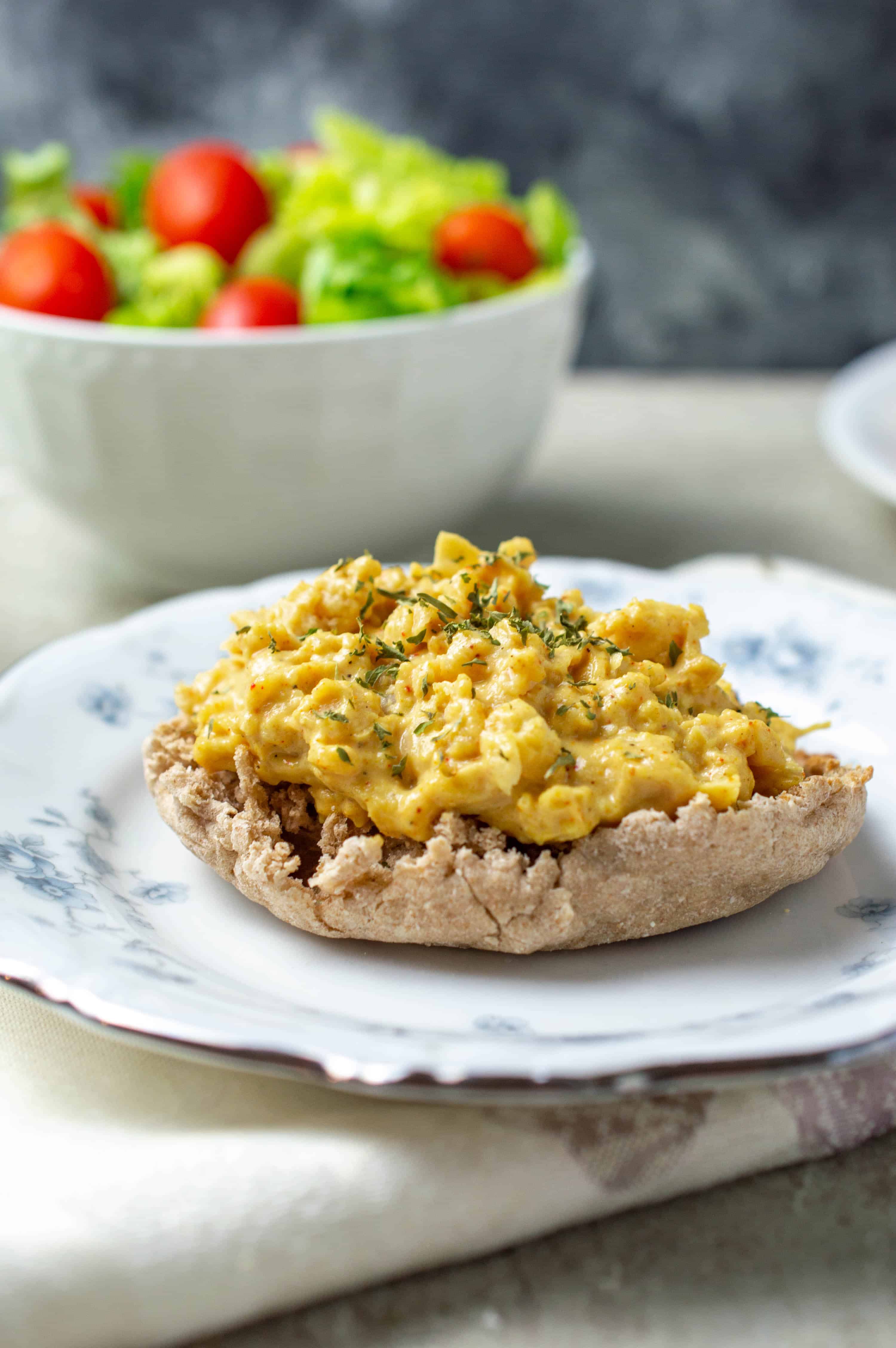 vegetarian chicken salad on a plate with a side salad