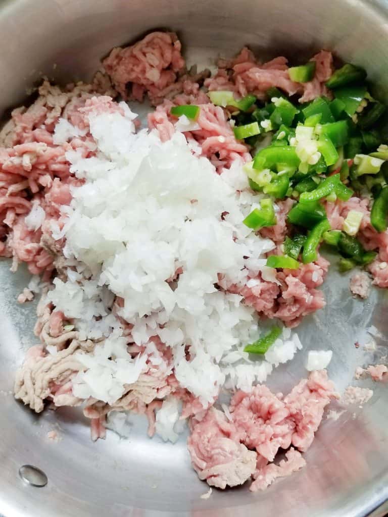 Ground turkey, onion, and jalapeño in a saute pan