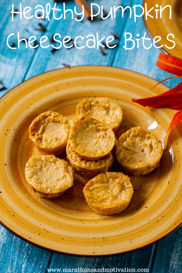 Healthy pumpkin cheese cake bites on an orange plate with a blue background