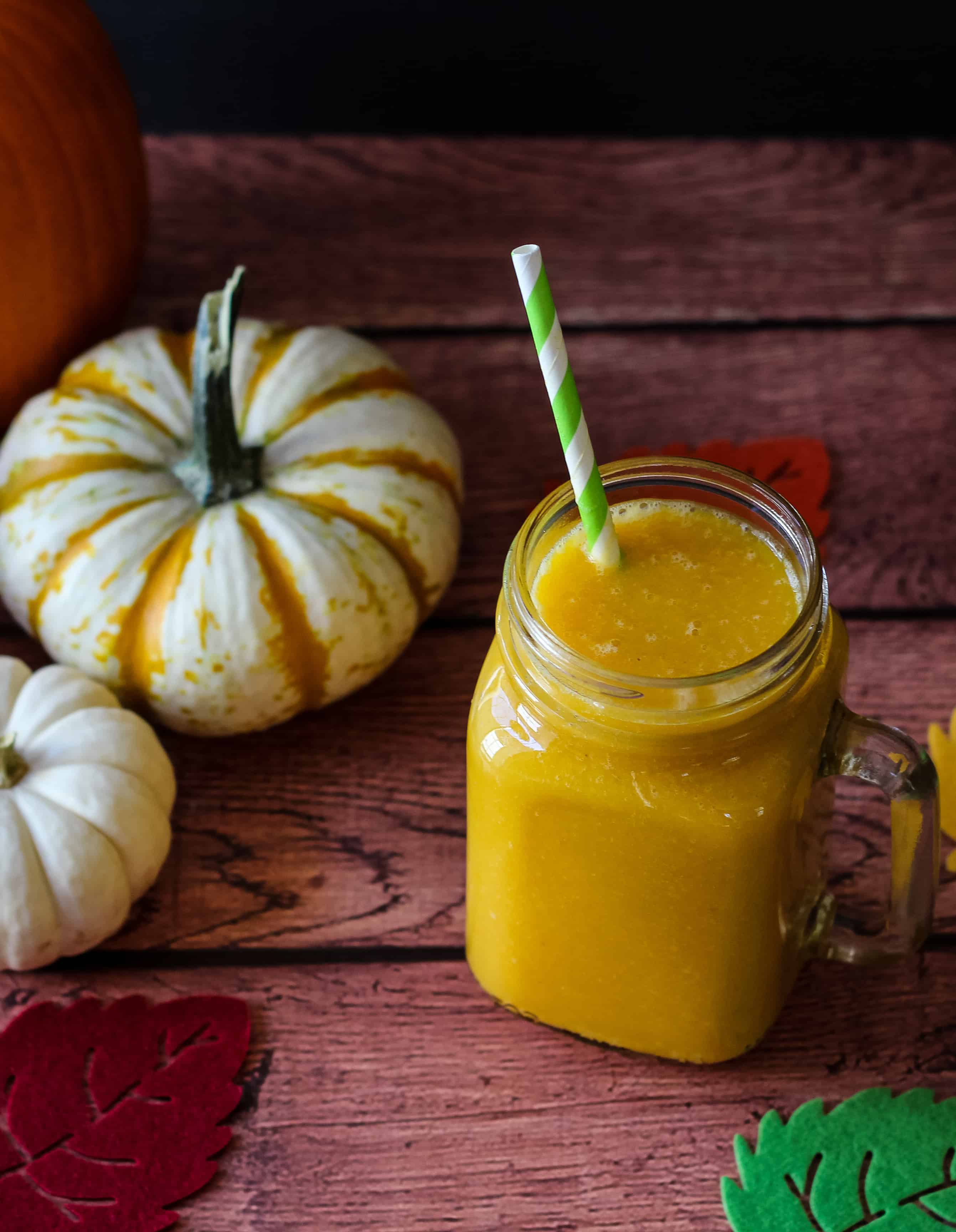 pumpkin smoothie on wood background
