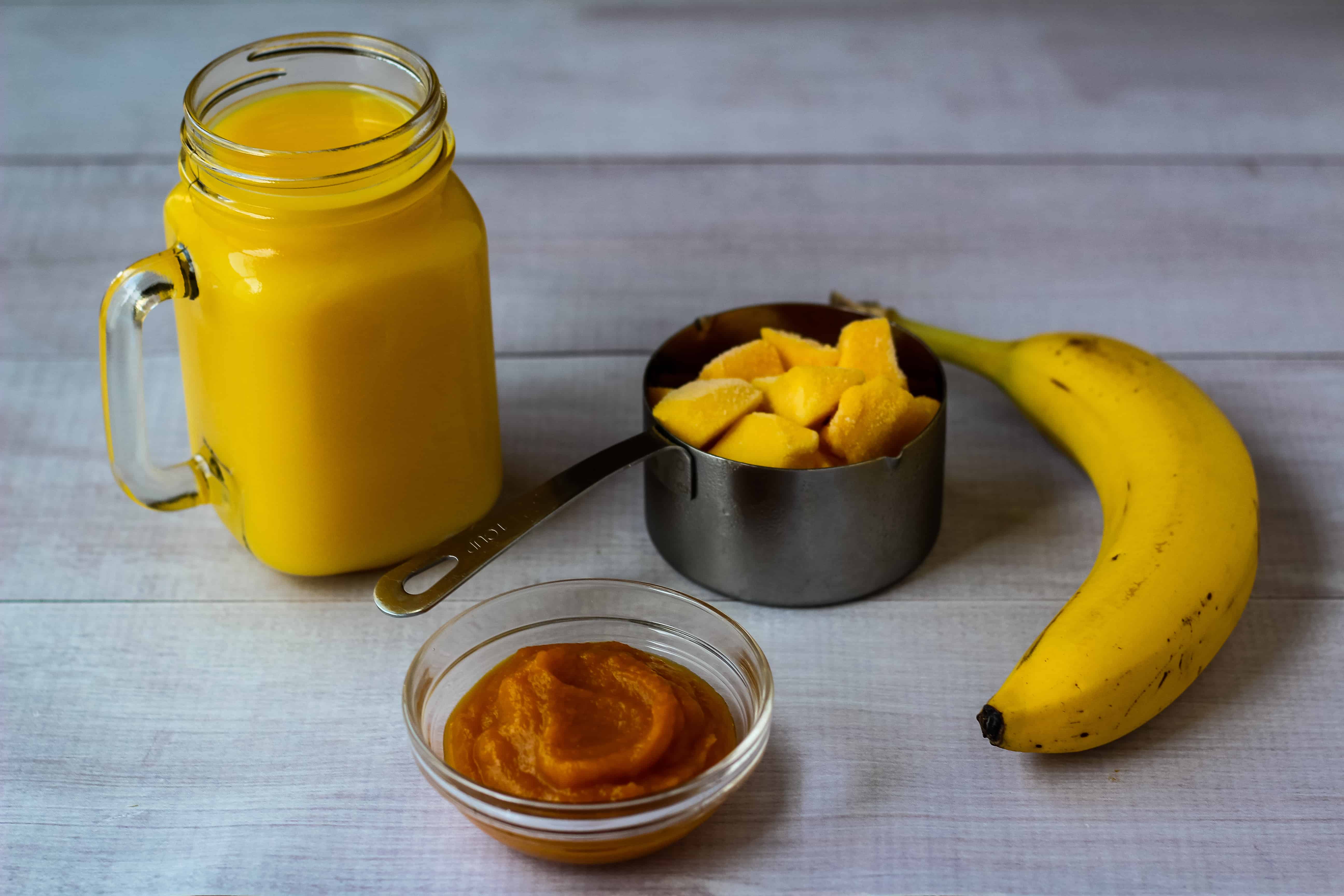 Pumpkin smoothie ingredients on white background