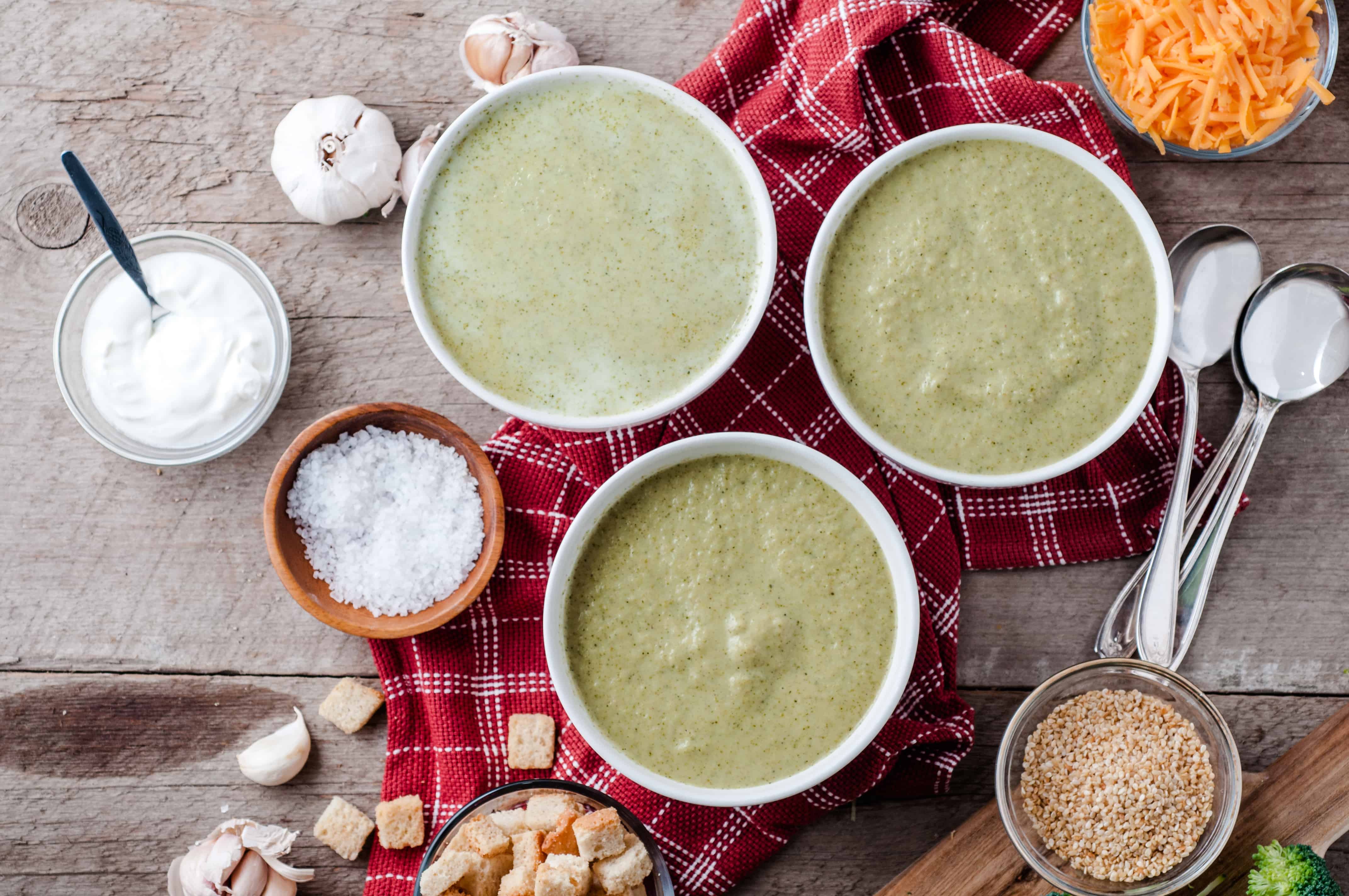 three bowls of Vegetarian Cream of Broccoli Soup