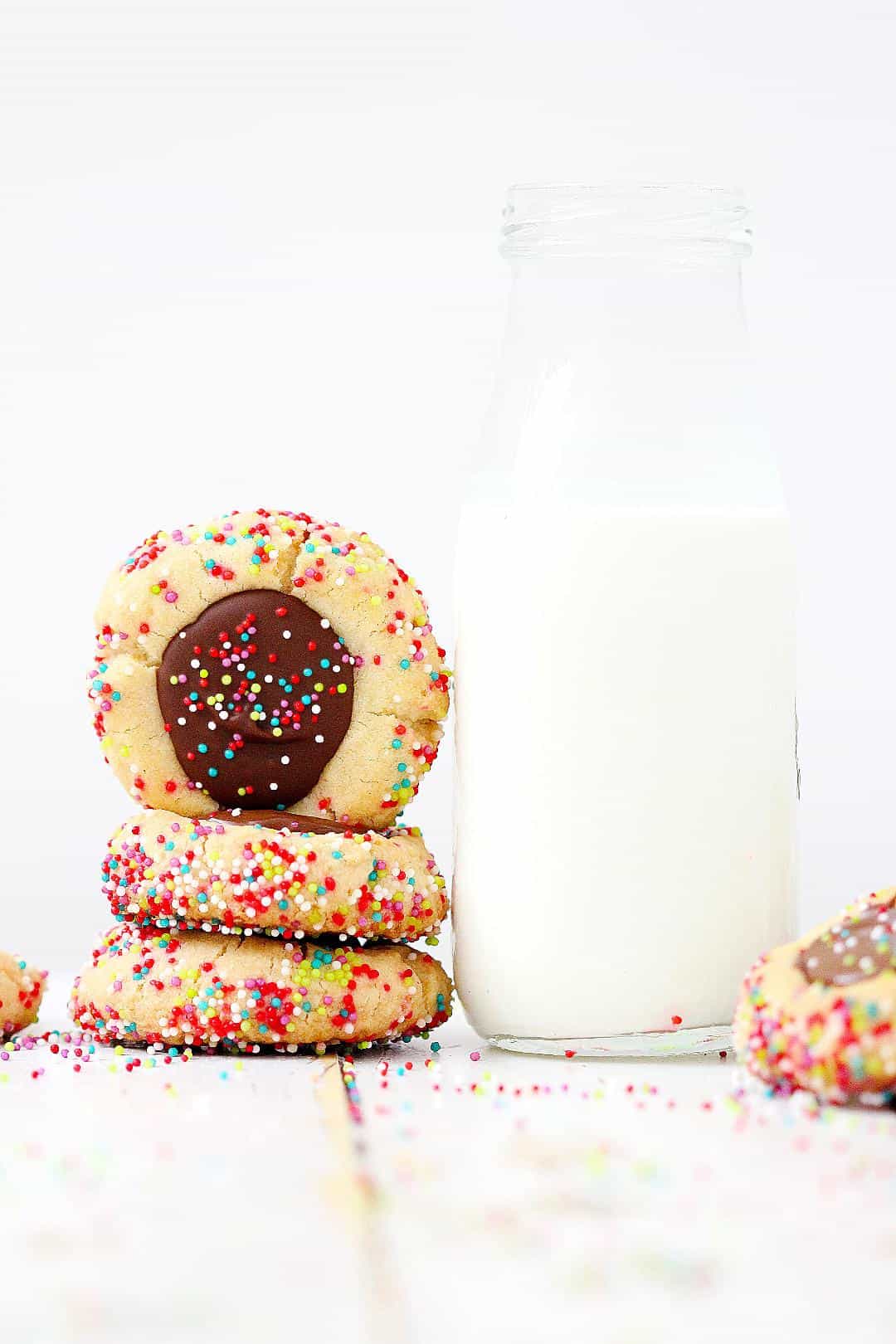 Chocolate Thumbprint Cookies with glass of milk