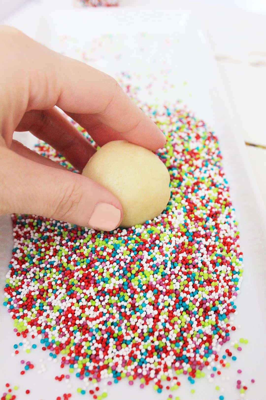 Cookie ball rolled in sprinkles