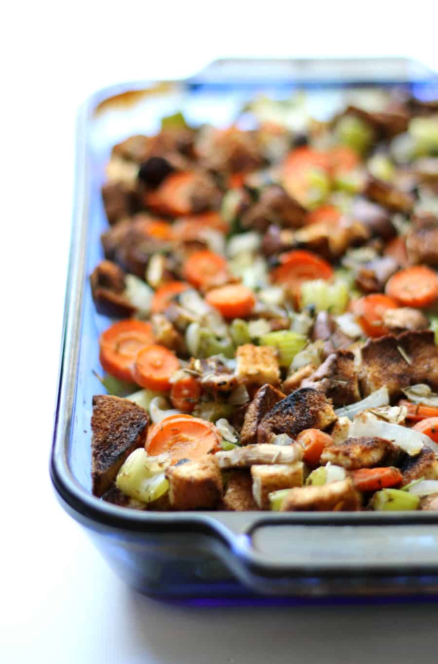 Vegan stuffing in a 13 x 9 glass baking dish