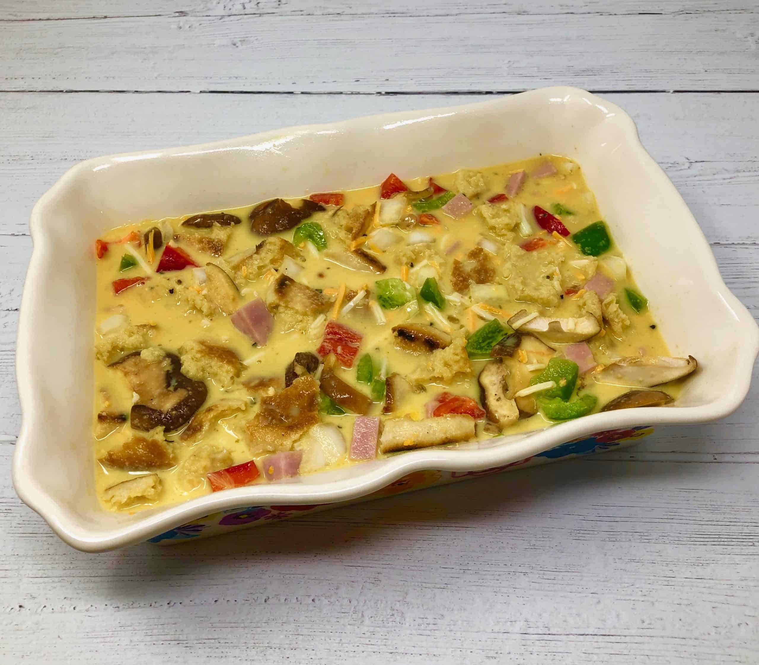 Ham and vegetable strata in baking dish.