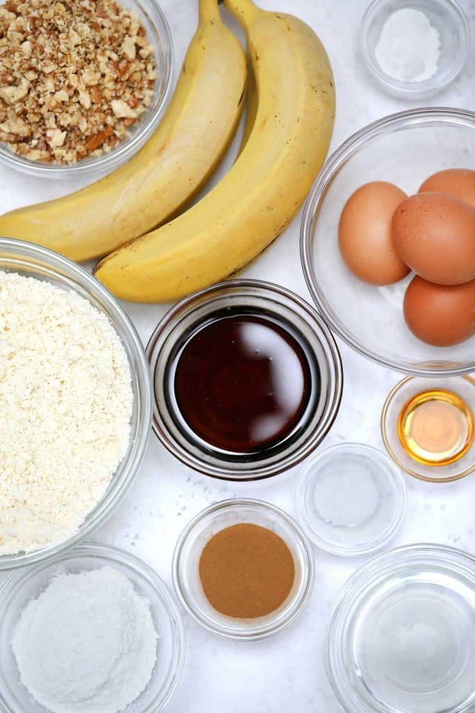 Ingredients for banana bread on a white background.
