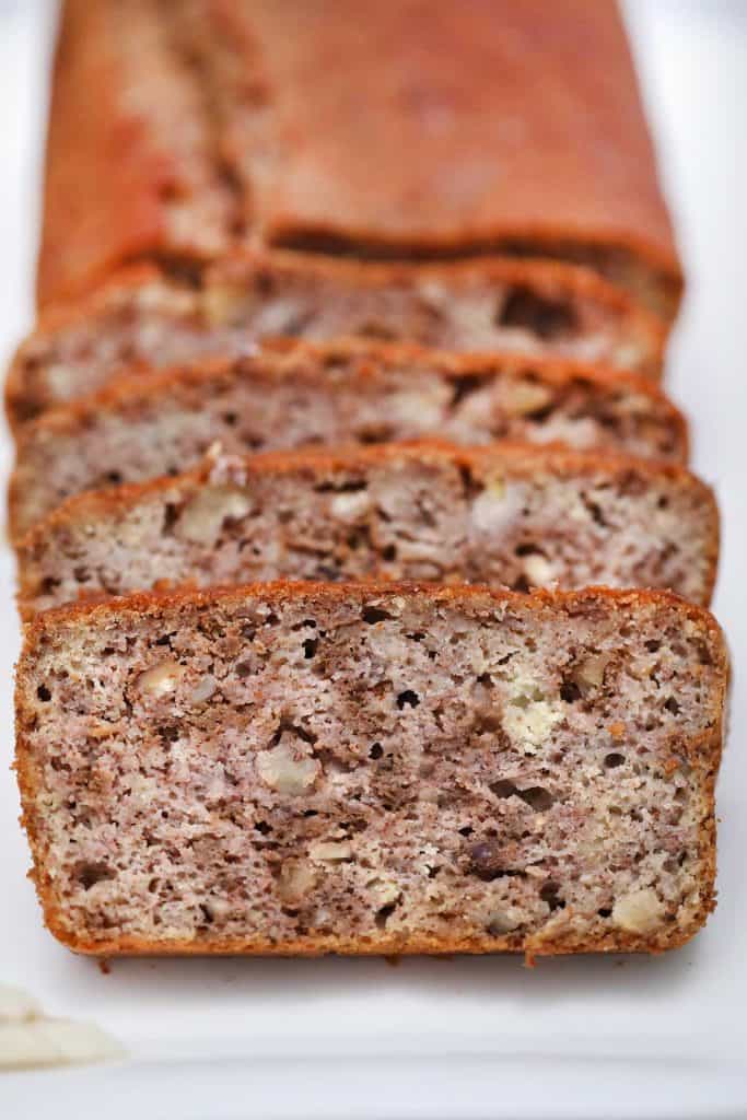 Head on photo of sliced banana bread.