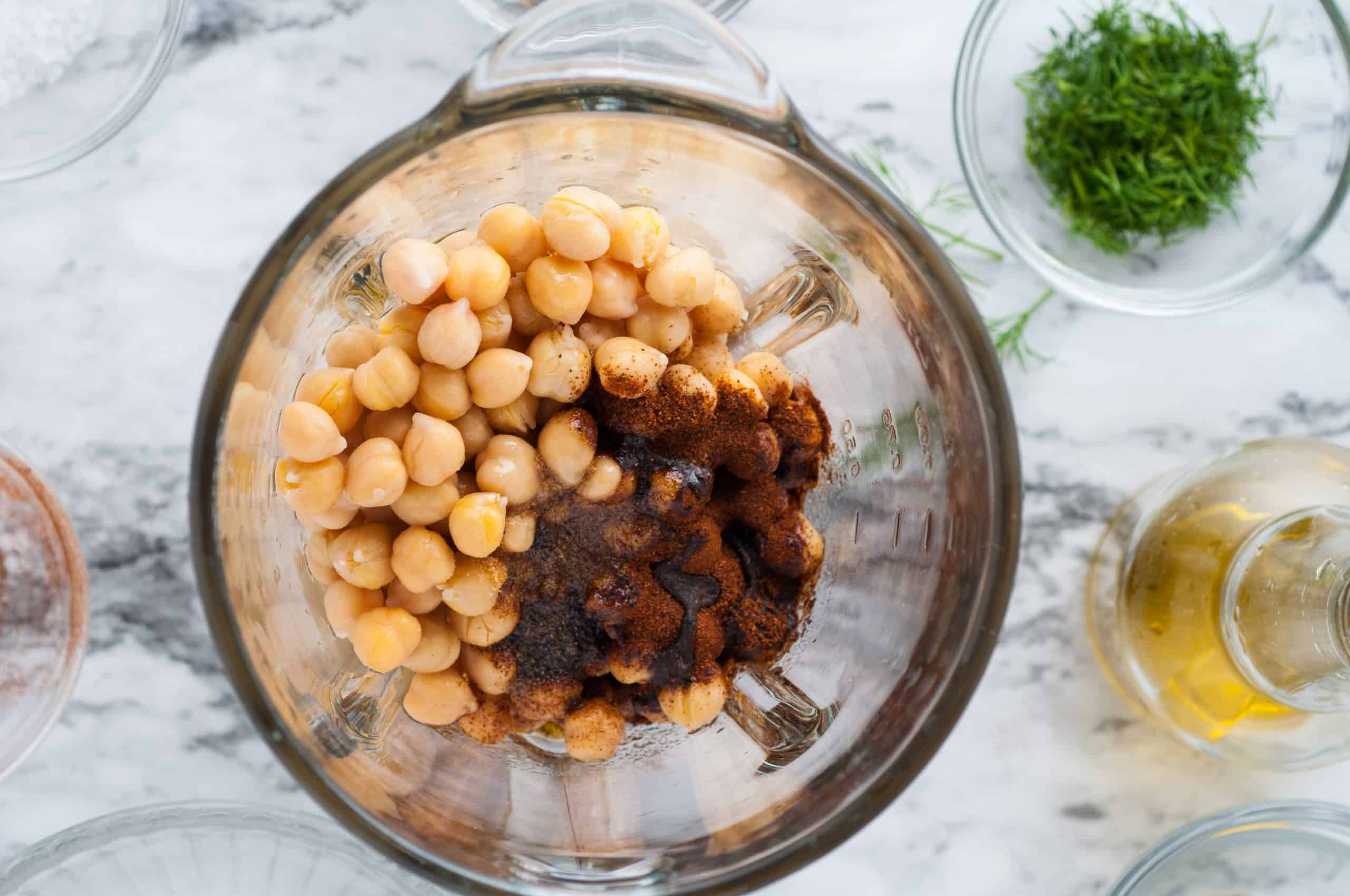 chickpeas and spices in a blender