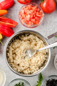 Couscous fluffed in a pan