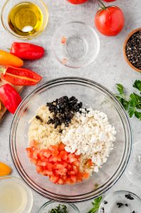 Mediterranean couscous salad being prepared