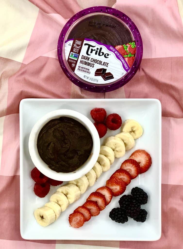 Tribe Chocolate Hummus with plate of fruit.