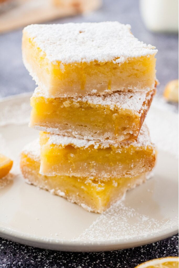 Lemon bars stacked on top of each other.