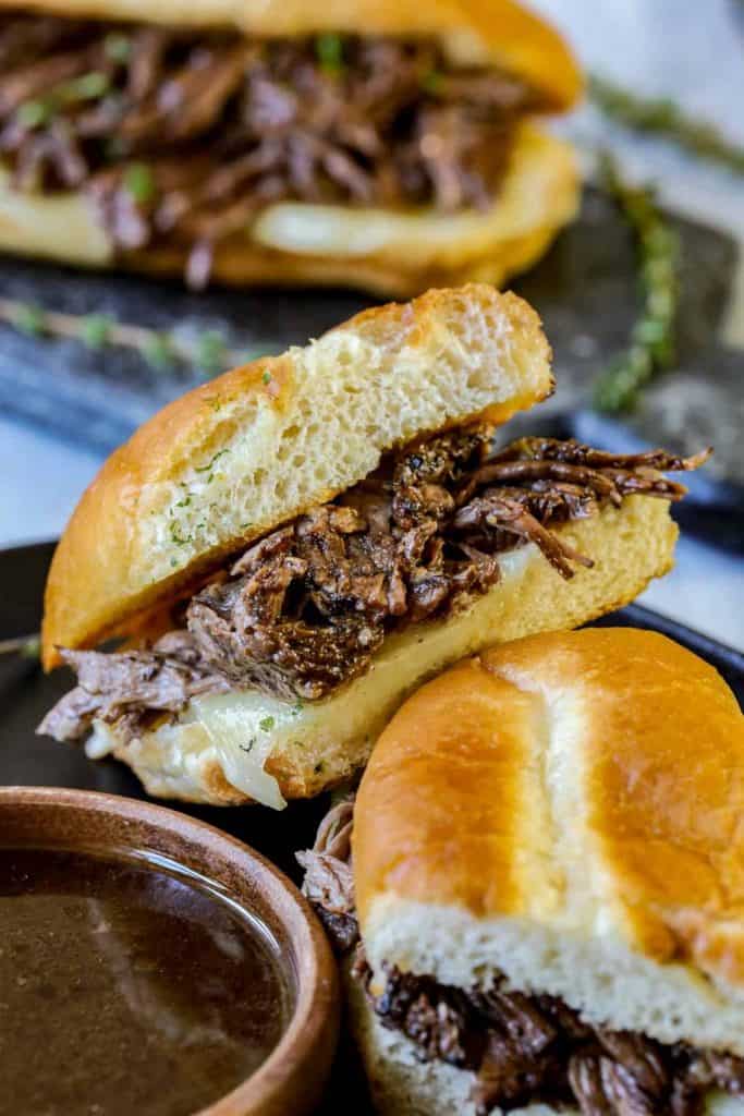 Crock Pot French Dip Sandwiches with au jus on the side.