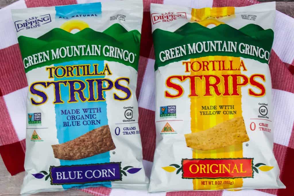 Overhead shot of bags of Green Mountain Gringo blue corn and original tortillas strips.