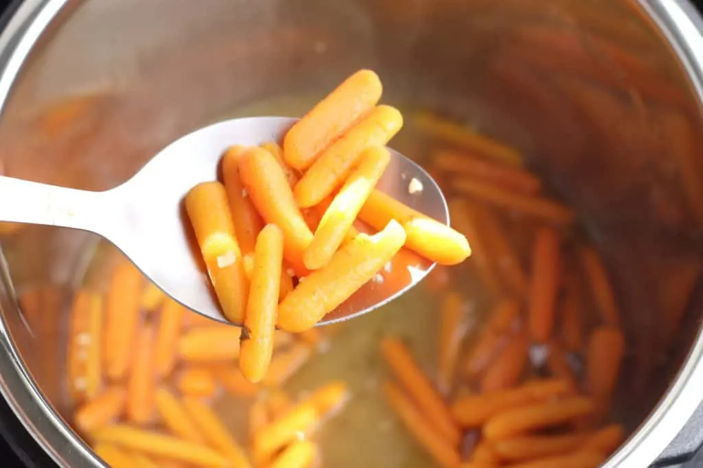 Instant Pot Carrots on a serving spoon.