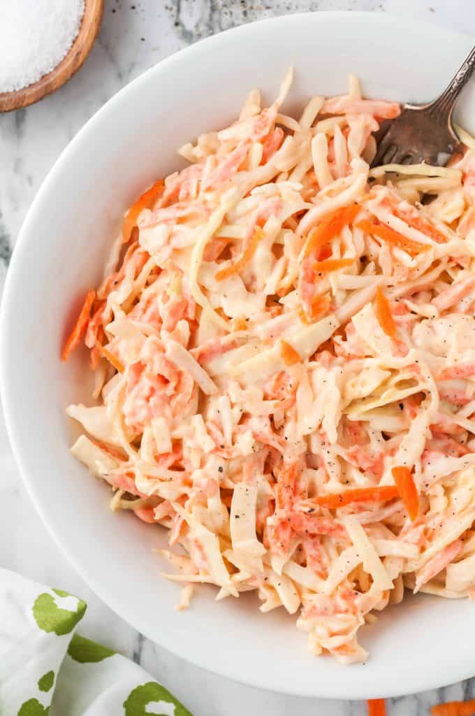 Classic Creamy Coleslaw Recipe in a large white serving bowl ready to be served.