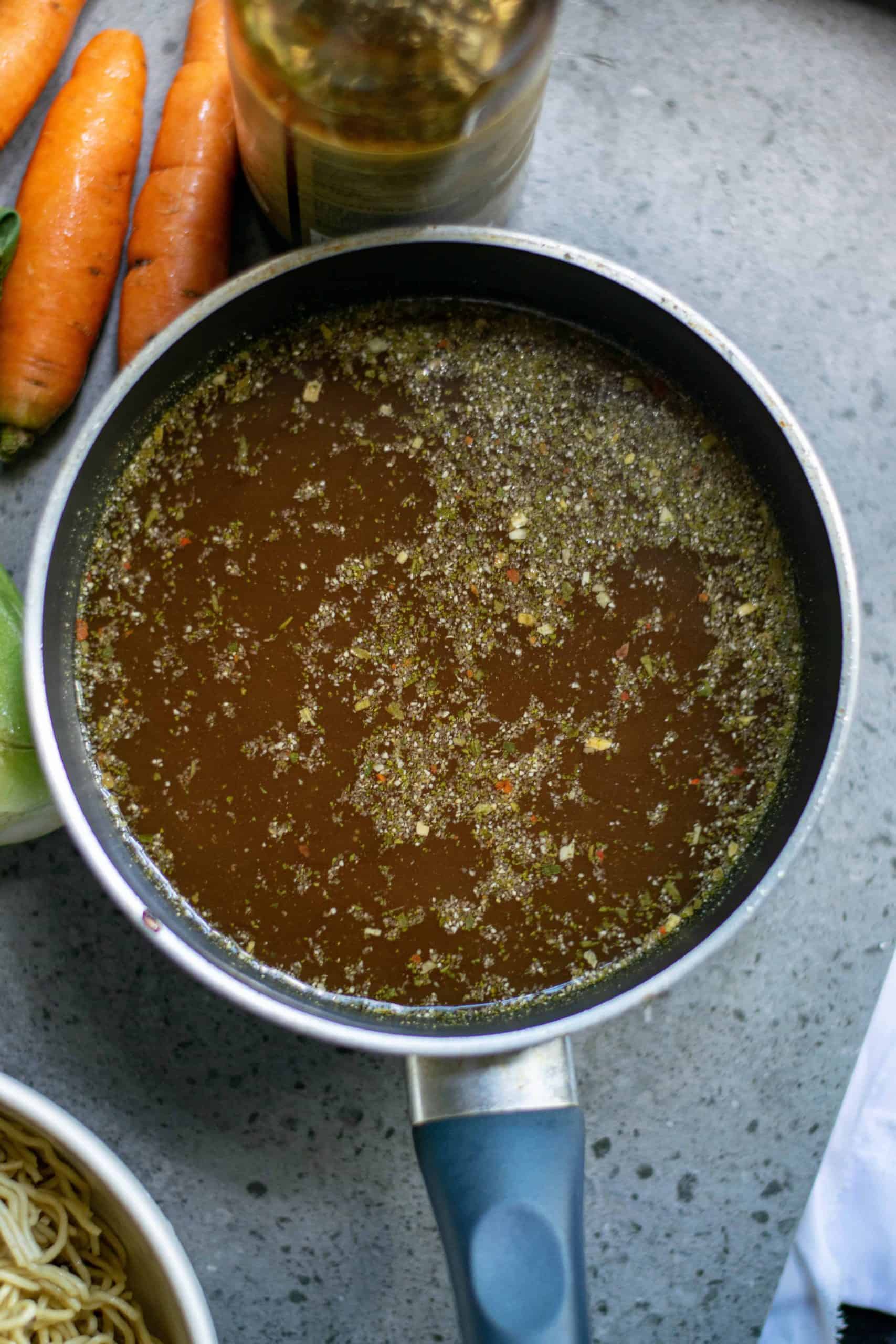 Vegetable Ramen Broth in a saucepan.