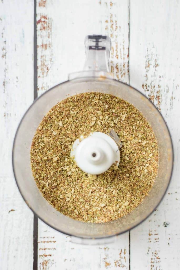 Pumpkin seeds and flax seeds chopped up in food processor.