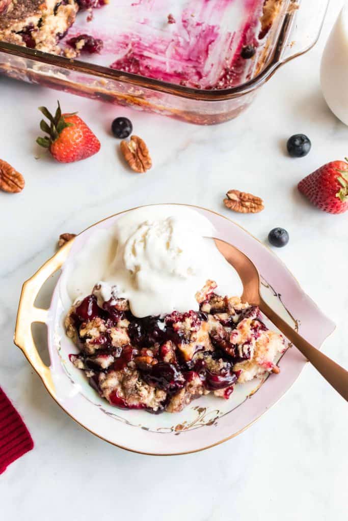 Baked Blueberry Strawberry Dump Cake a la mode.