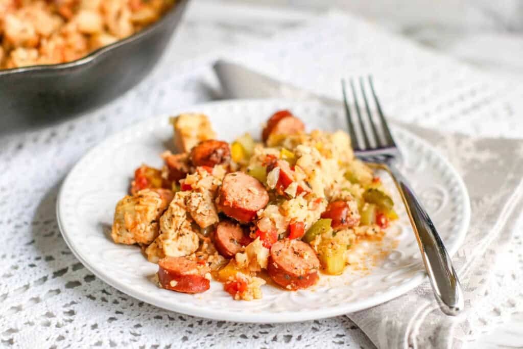 Low Carb Jambalaya on a white plate with a fork on the side.