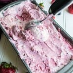 Triple Berry Ice cream with ice cream scoop in it.