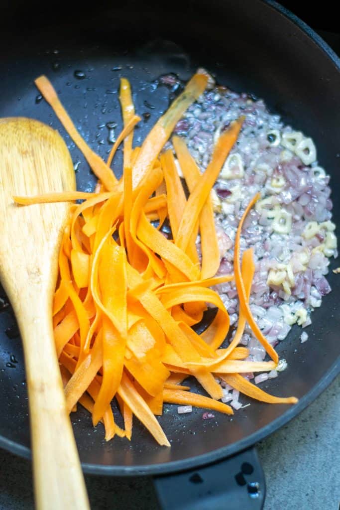 Carrots, onion and garlic in saute pan.