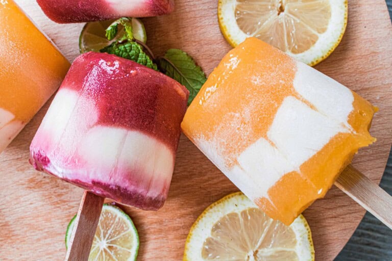 Mango and Raspberry Yogurt Popsicles