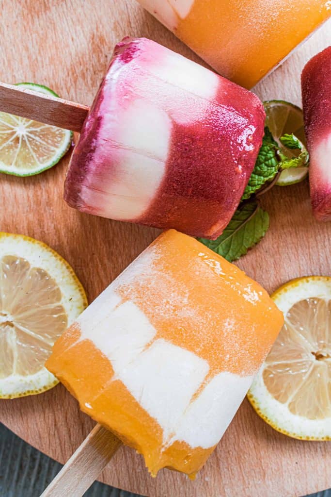 Overhead photo of Mango and Raspberry Yogurt Popsicles