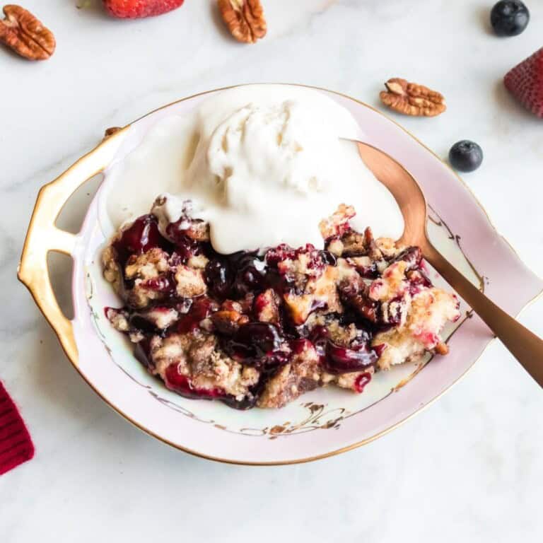 blueberry strawberry dump cake served a la mode