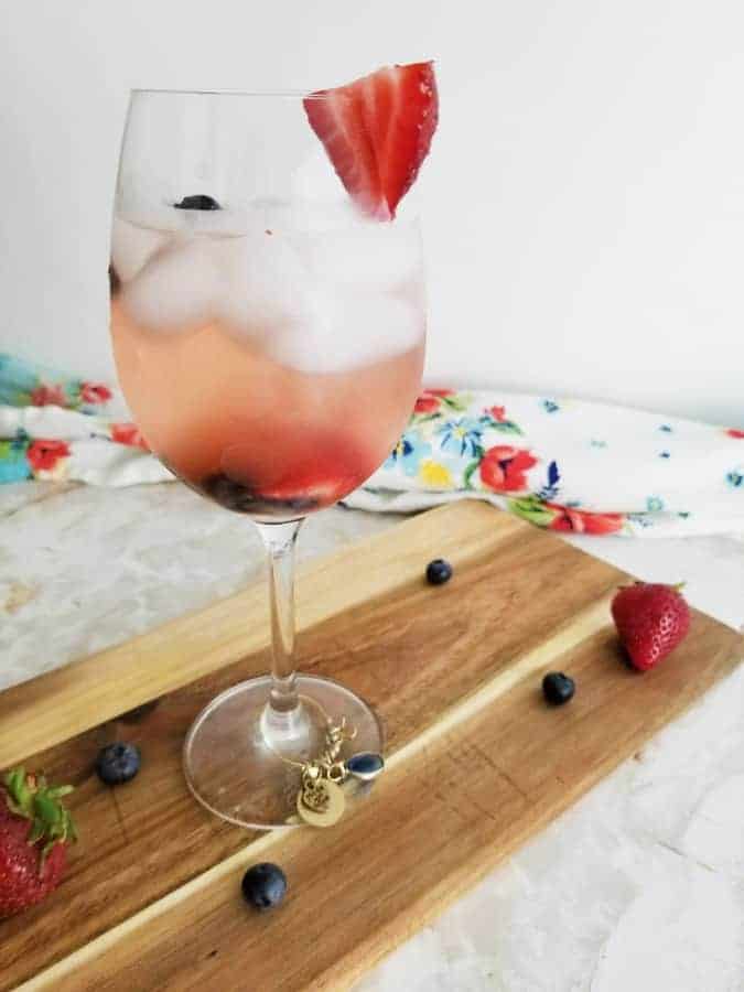 Berry Wine Spritzer on a cutting board.