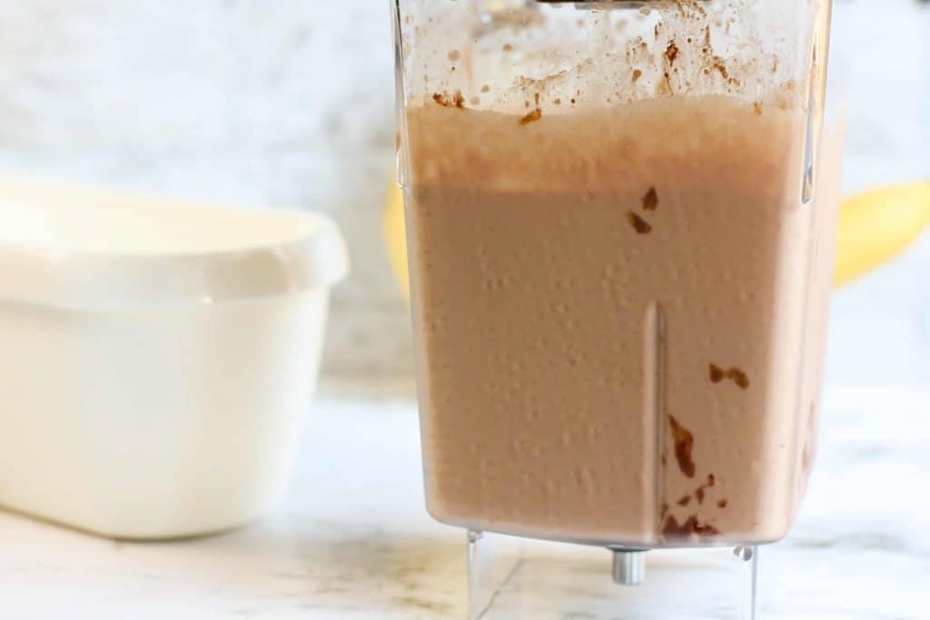 Chocolate ice cream in a blender.