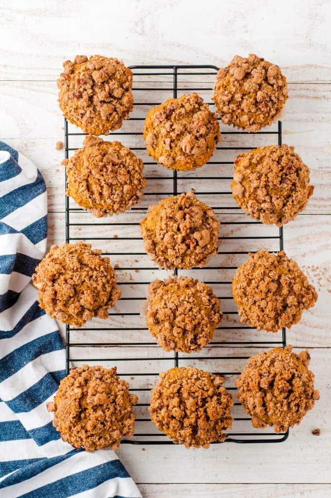 whole wheat pumpkin muffins on wire cooling rack.