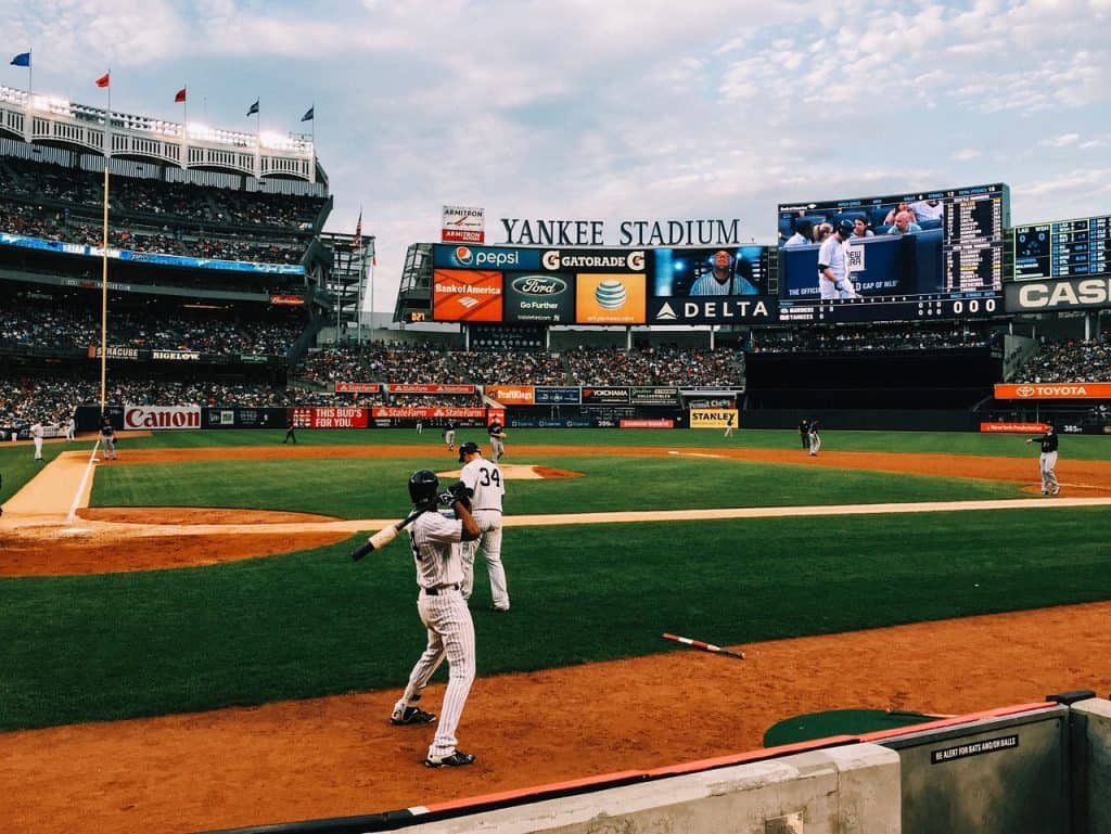 Color photo of Yankee Stadium while game is being played.