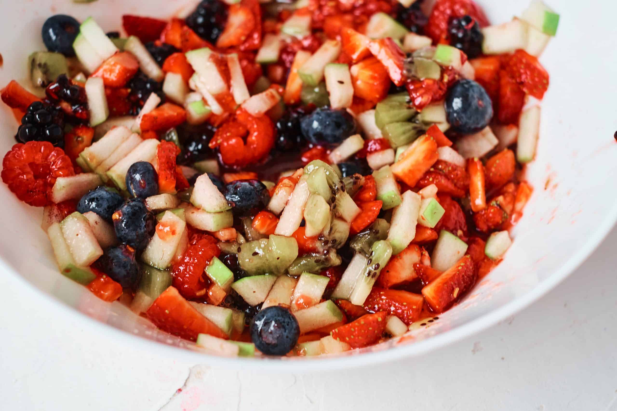 Fruit Salsa closeup in a white bowl.