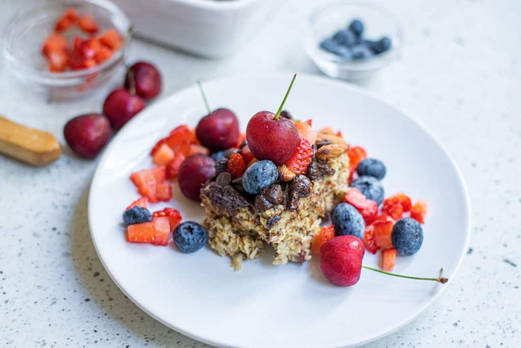 Baked oatmeal topped with fruit.