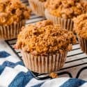 Closeup of pumpkin muffins on a cooling rack.