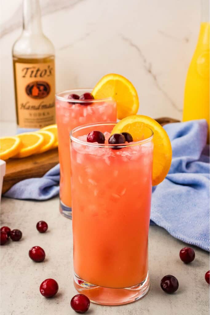 Two Madras cocktails made with vodka, cranberry juice, and orange juice over ice