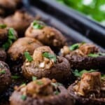 Oven roasted mushrooms on a baking sheet.