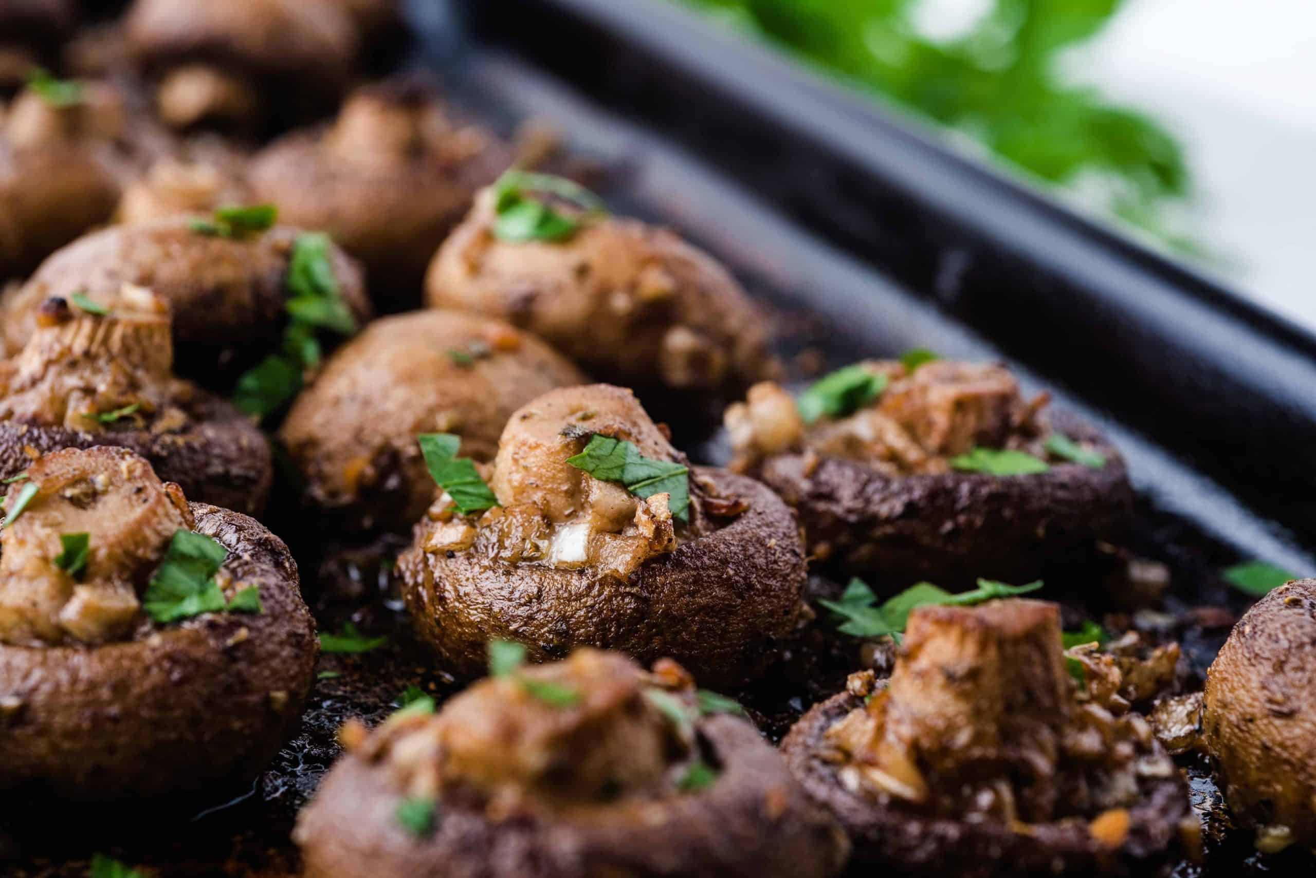 Oven roasted mushrooms on a baking sheet.