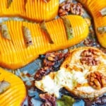 Overhead view of hasselback style roasted butternut squash with baked brie.