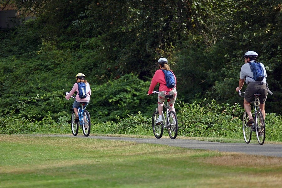 A family out for a bike ride.