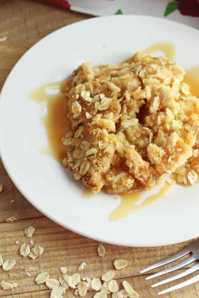 Apple Crumble Dump Cake in a white bowl.