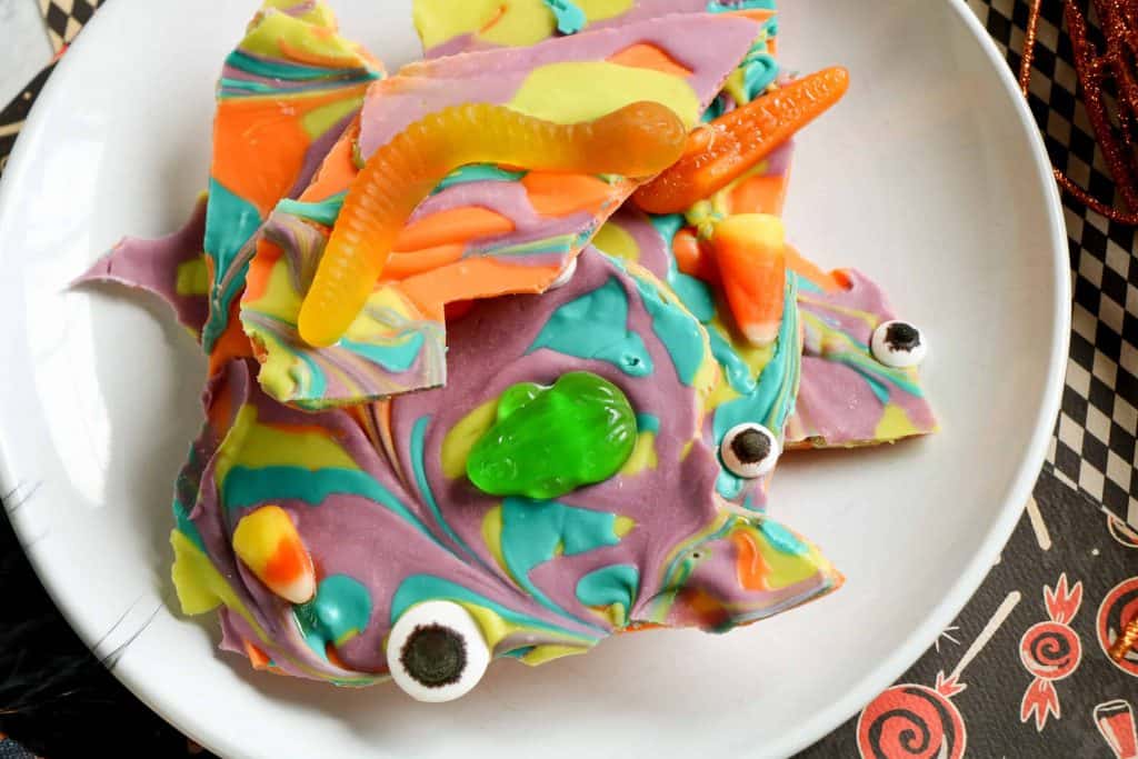 Witch's Brew Halloween Bark on a white plate.