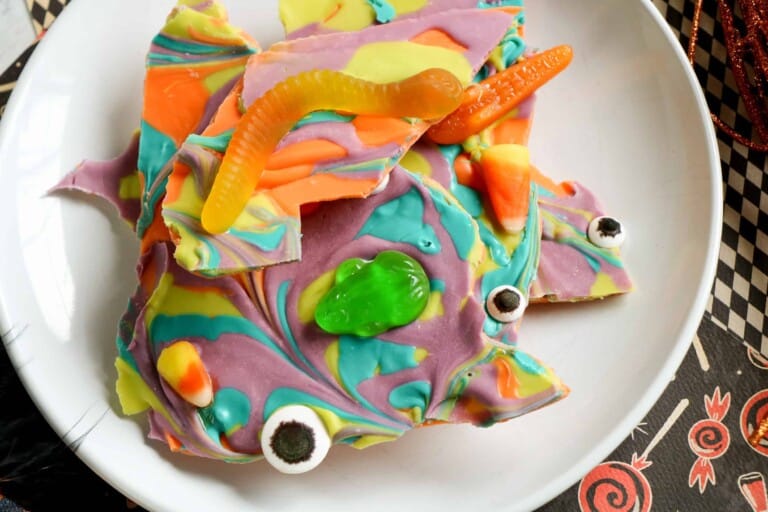 Witch's Brew Halloween Bark on a white plate.